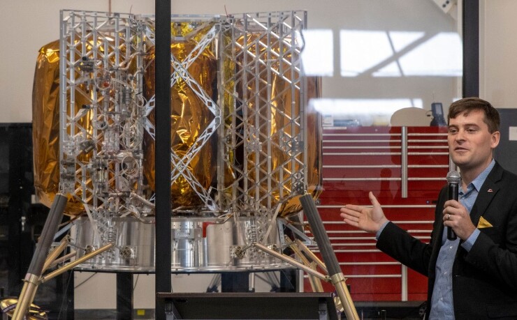 John Thornton, CEO of Astrobotic, shows off the Peregrine lunar lander at its headquarters in Pittsburgh.